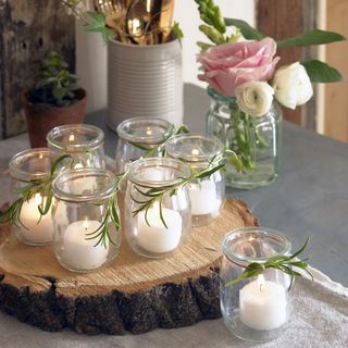 wood with candle glass and blur background