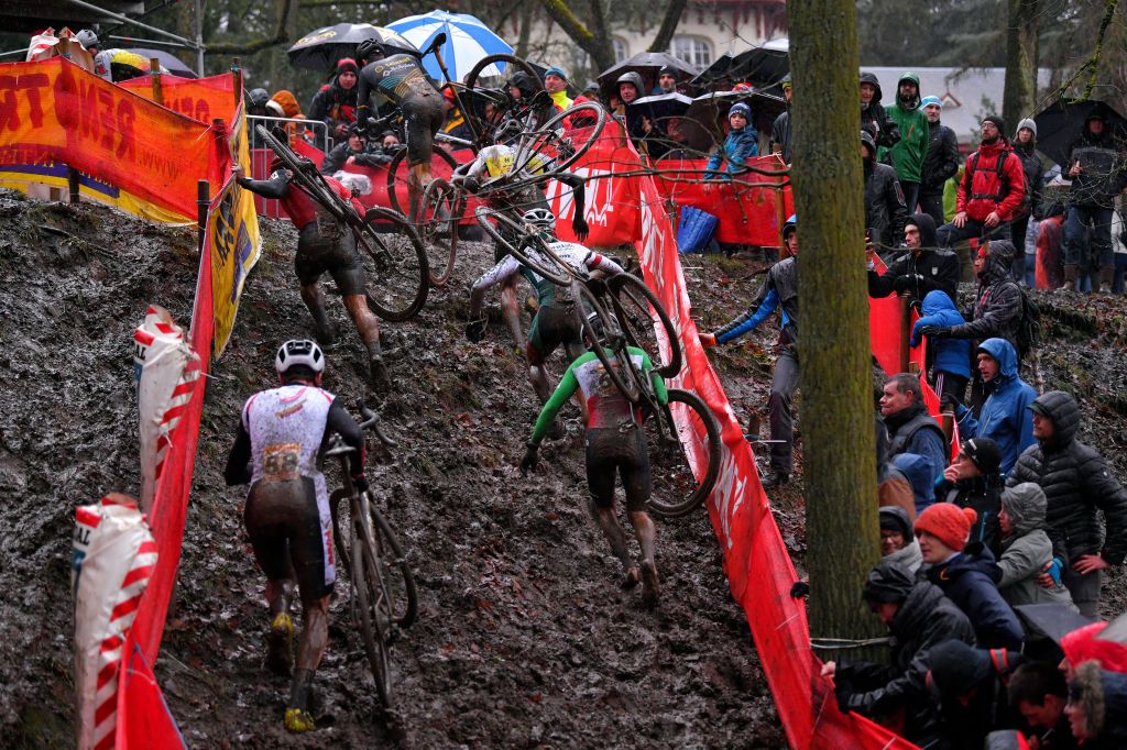 NAMUR BELGIUM DECEMBER 22 Nicola Rohrbach of Switzerland Peloton Public Fans Mud Landscape during the 11th Namur World Cup 2019 UCICX TelenetUCICXWC on December 22 2019 in Namur Belgium Photo by Luc ClaessenGetty Images