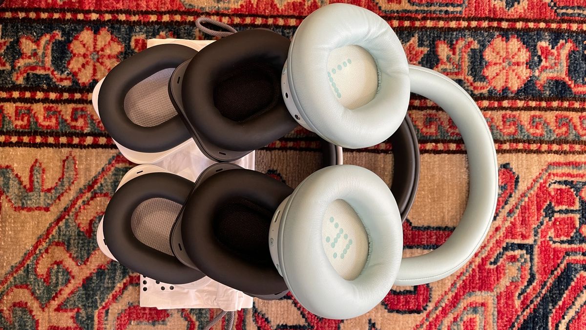 Nothing headphones arranged together, to show the different cases
