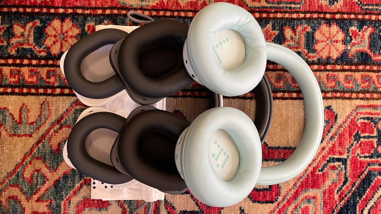 Nothing headphones arranged together, to show the different cases