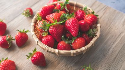 bowl full of fresh ripe red strawberries 