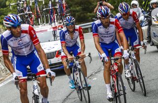 Groupama-FDJ teammates surround Thibaut Pinot as he struggles during stage 20 at the Giro