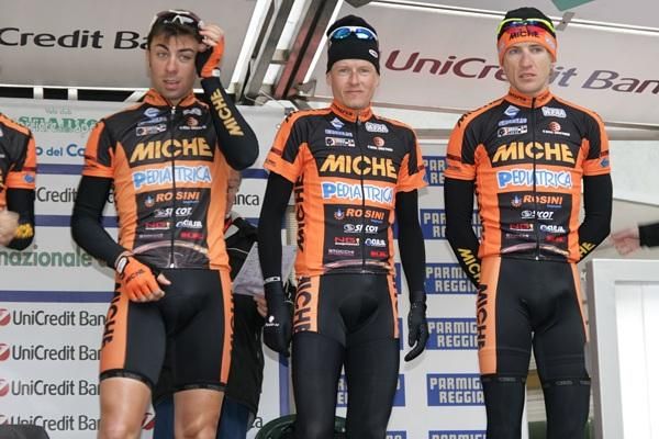 Michael Rassmussen, center, and his Miche teammates are presented prior to the stage.