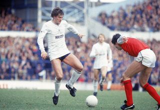 Glenn Hoddle on the ball for Tottenham against Arsenal in 1985.