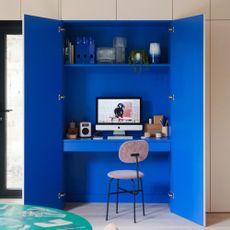 blue office cupboard with computer