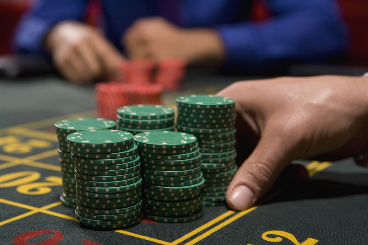 Hand betting gambling chips