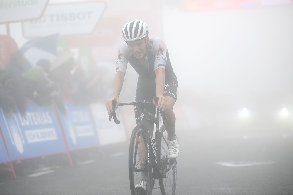 SAN MIGUEL DE AGUAYO SPAIN AUGUST 25 Remco Evenepoel of Belgium and Team QuickStep Alpha Vinyl crosses the finishing line second place during the 77th Tour of Spain 2022 Stage 6 a 1812km stage from Bilbao to Ascensin al Pico Jano San Miguel de Aguayo 1131m LaVuelta22 WorldTour on August 25 2022 in Pico Jano San Miguel de Aguayo Spain Photo by Tim de WaeleGetty Images