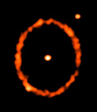 a white orange dot in the center of a red orange ring. another dot hovers upper right, outside the ring.