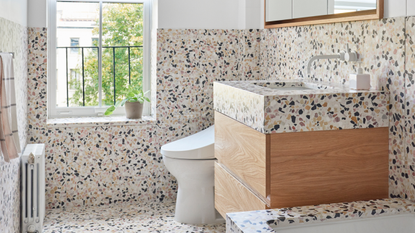 a bathroom with terrazzo tiles