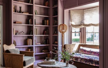 A living room with a bay window