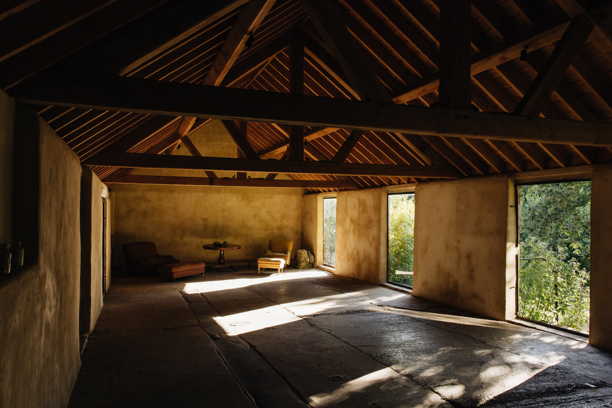 Interiors and gardens of a former milking parlour in Berkshire