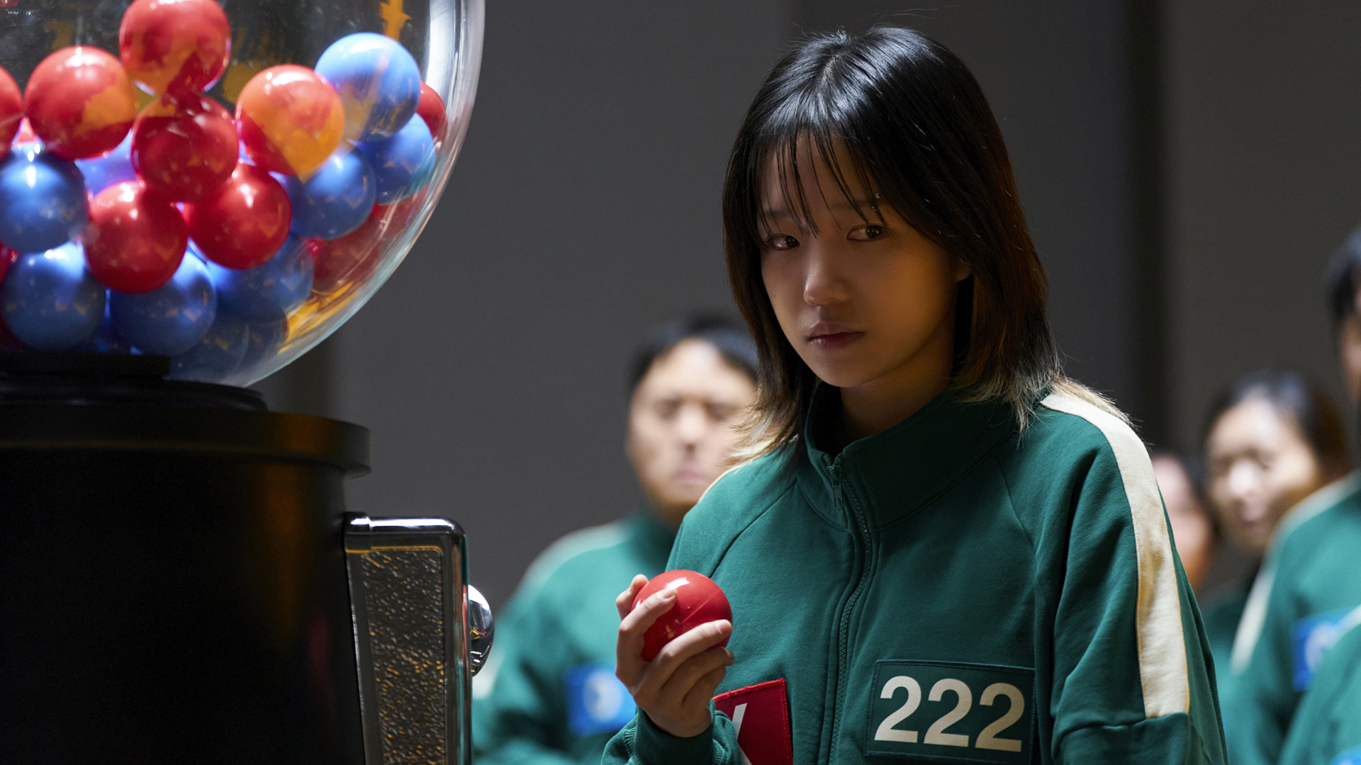 Jun-hee looking nervous as she holds a red ball in Squid Game season 3