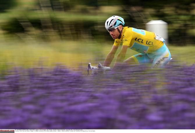Vincenzo Nibali (Astana) passes by one of the many fields of lavender on stage 15