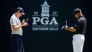 Matt Fitzpatrick and Billy Foster taking notes at the 2022 PGA Championship