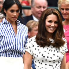 Meghan, Duchess of Sussex and Catherine, Duchess of Cambridge attend day twelve of the Wimbledon Lawn Tennis Championships at All England Lawn Tennis and Croquet Club on July 14, 2018 in London, England.