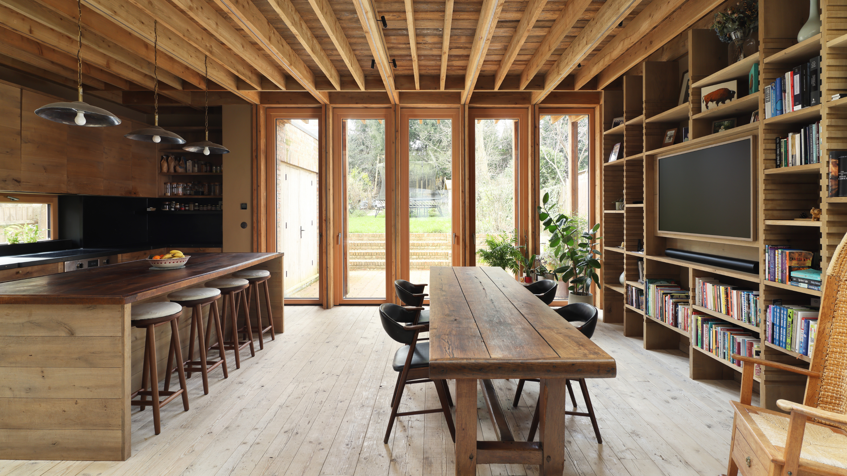 wooden clad kitchen in a timber frame 