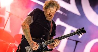 Brent Hinds plays a bespoke ESP offset live in Mexico as he performs with Mastodon in 2022.