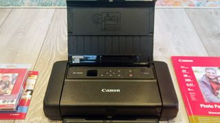 Canon PIXMA TR150 Wireless Inkjet Printer being tested in writer's home