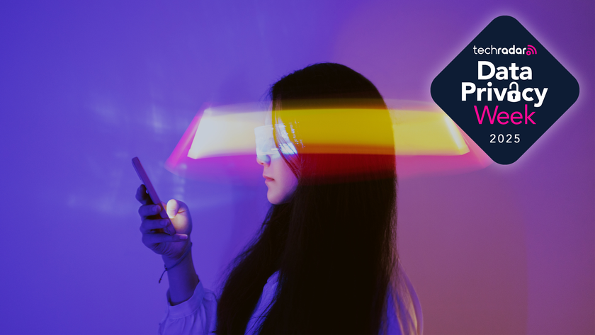 Young woman holds a smartphone with a beam of light obscuring her eyes