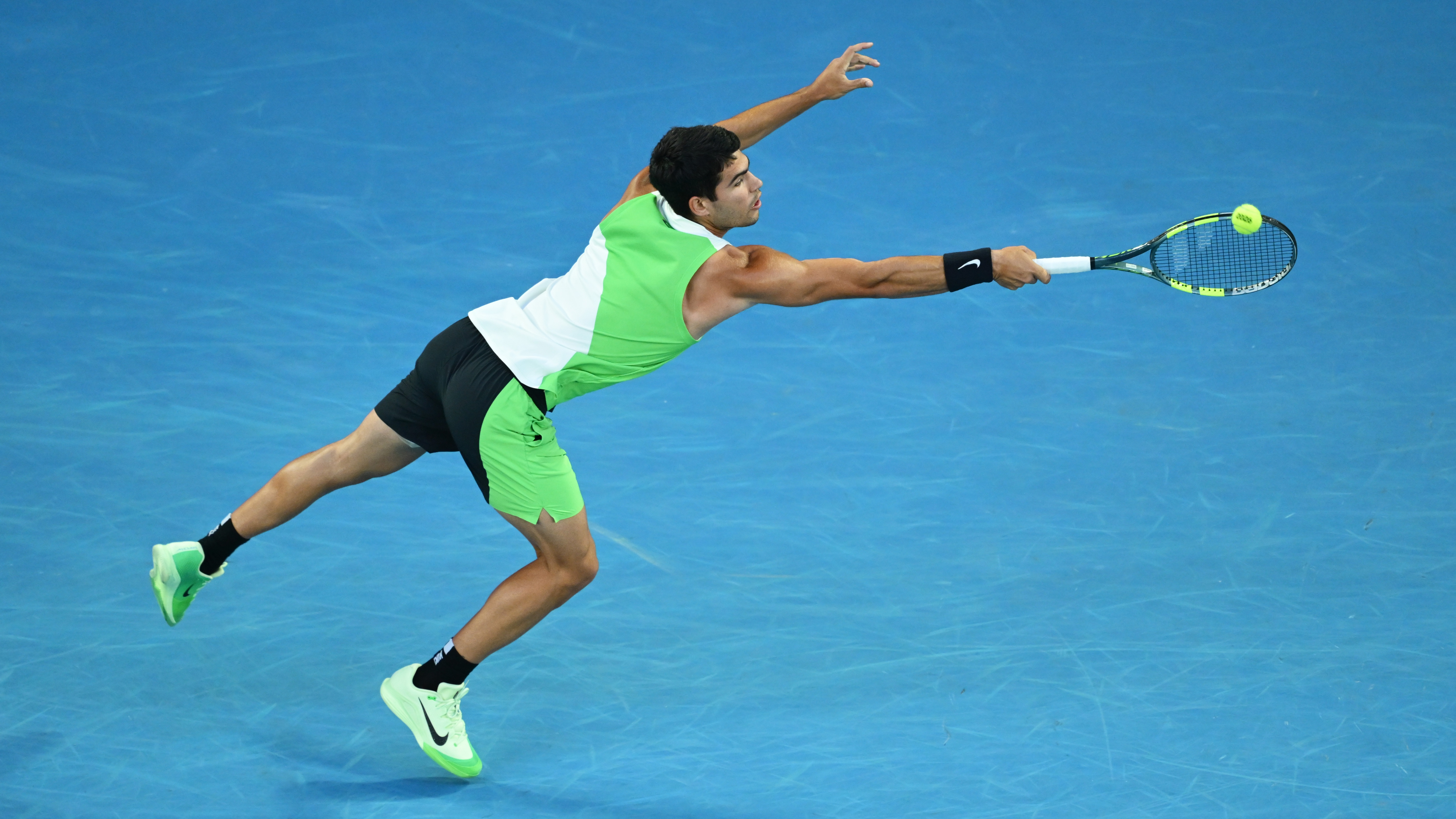 Alcaraz throws himself around the court