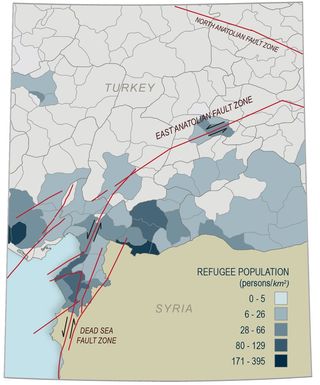More than 2.5 million Syrian refugees (shades of blue) are now living in seismically active areas on Turkey (fault lines in red).
