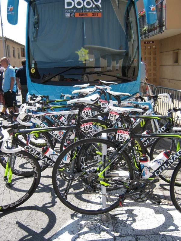 The Colnago bikes wait in the sun for the BBox Bouygues Telecom riders