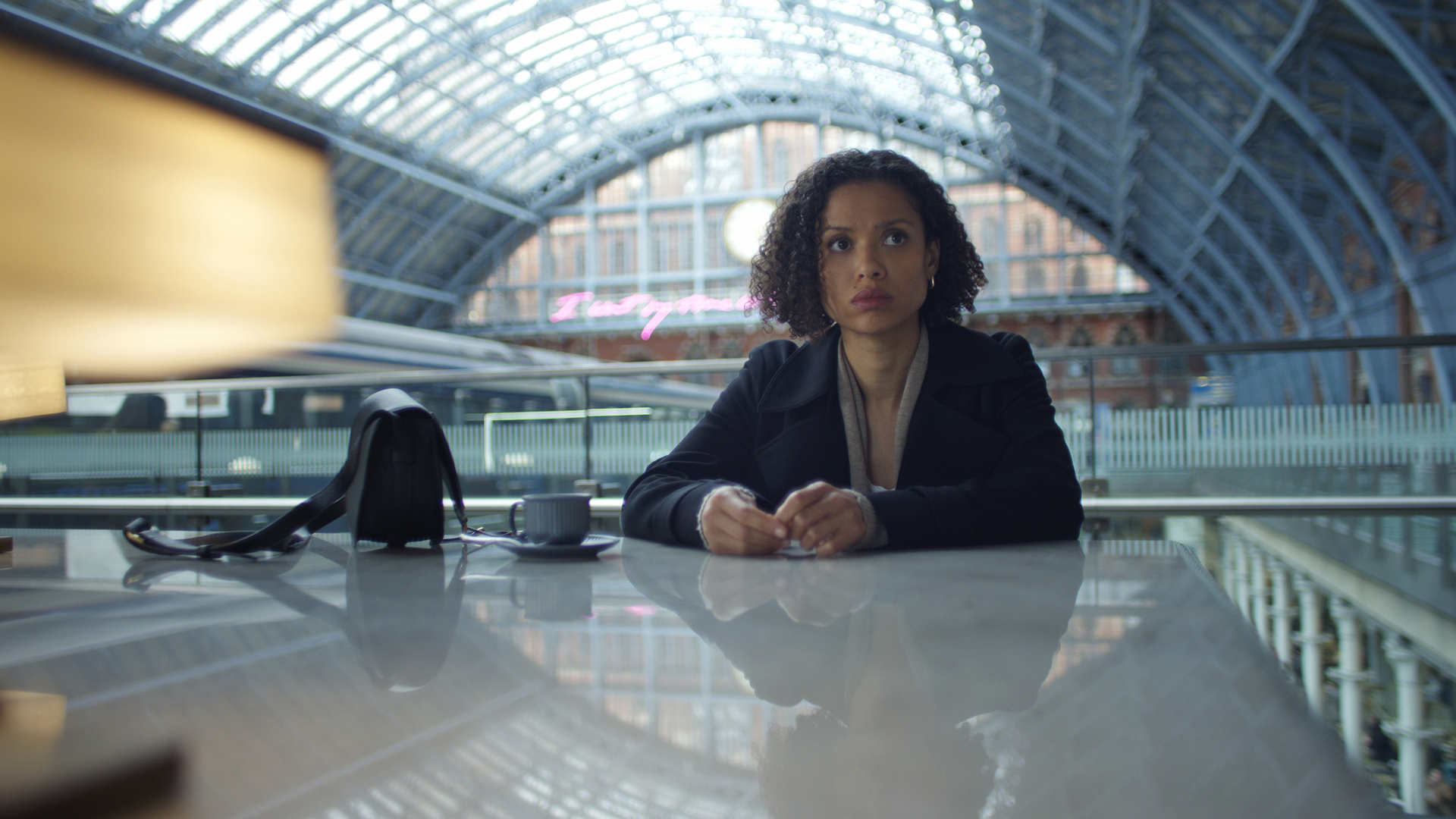 Sophie sitting down and looking worried in Surfaces season 2