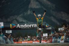 Alan Hatherly celebrates winning the UCI Mountain Bike World Championships in Andorra, 2024.