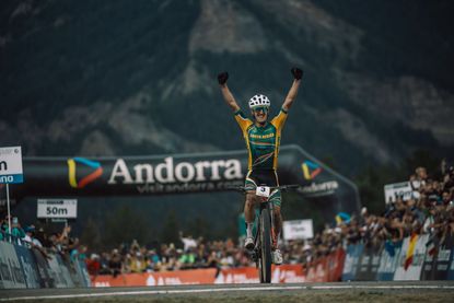 Alan Hatherly celebrates winning the UCI Mountain Bike World Championships in Andorra, 2024.