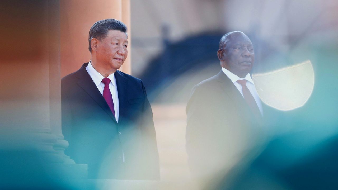 China’s Xi Jinping stands with South Africa’s Cyril Ramaphosa at a welcome ceremony in Pretoria today 