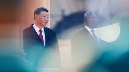 China’s Xi Jinping stands with South Africa’s Cyril Ramaphosa at a welcome ceremony in Pretoria today 