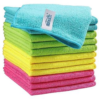 Pink, yellow, green, and blue microfiber cloths stacked on top of one another