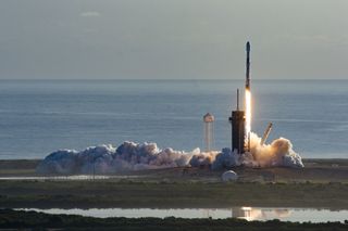 A SpaceX Falcon 9 rocket launches 60 of the company's Starlink internet satellites from Pad 39A of NASA's Kennedy Space Center in Florida on March 18, 2020.
