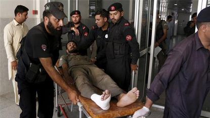 A soldier injured during Friday's Taliban attack in Peshawar.