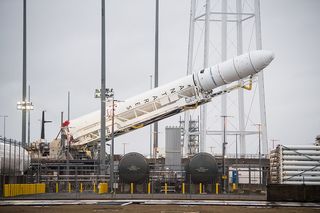 The Antares rocket and Cygnus capsule headed to the International Space Station on Feb. 9, 2020, was raised to vertical position on a launchpad at NASA's Wallops Flight Facility in Virginia.
