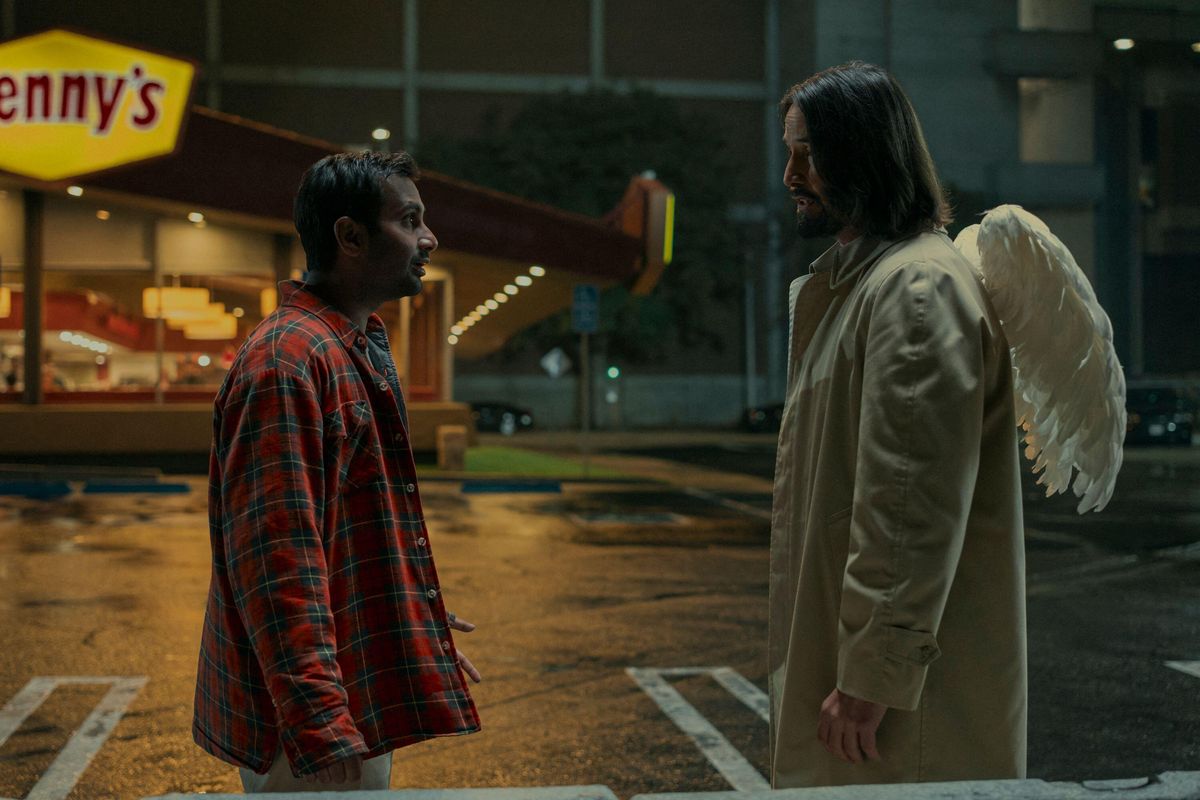 (From L to R) Aziz Ansari as Arj and Keanu Reeves as the angel Gabriel in Good Fortune, now streaming on Prime Video