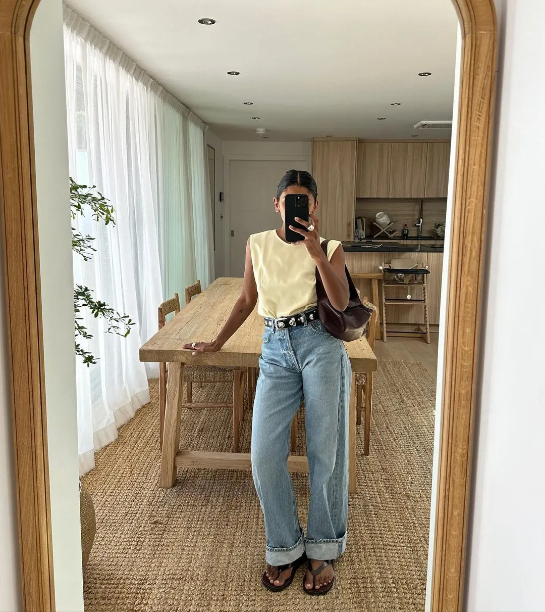 Monikh wears The Row flip flops for summer 2026