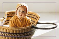 Old fashioned baby names illustrated by baby in basket