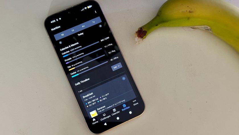 A phone showing the new Nutrition Tracking widget with Garmin Connect Plus, with a banana sitting next to the phone.