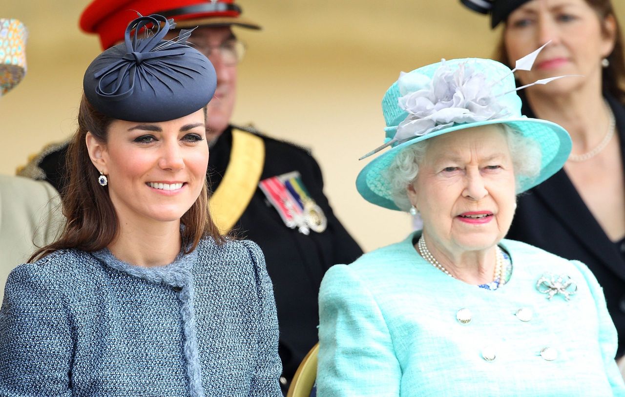 Catherine, Duchess of Cambridge and Queen Elizabeth II are seen talking during a visit to Vernon Park