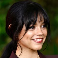 Jenna Ortega wearing a French girl fringe