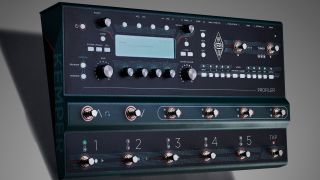 A Kemper Profiler Stage multi-effects pedal on a grey floor