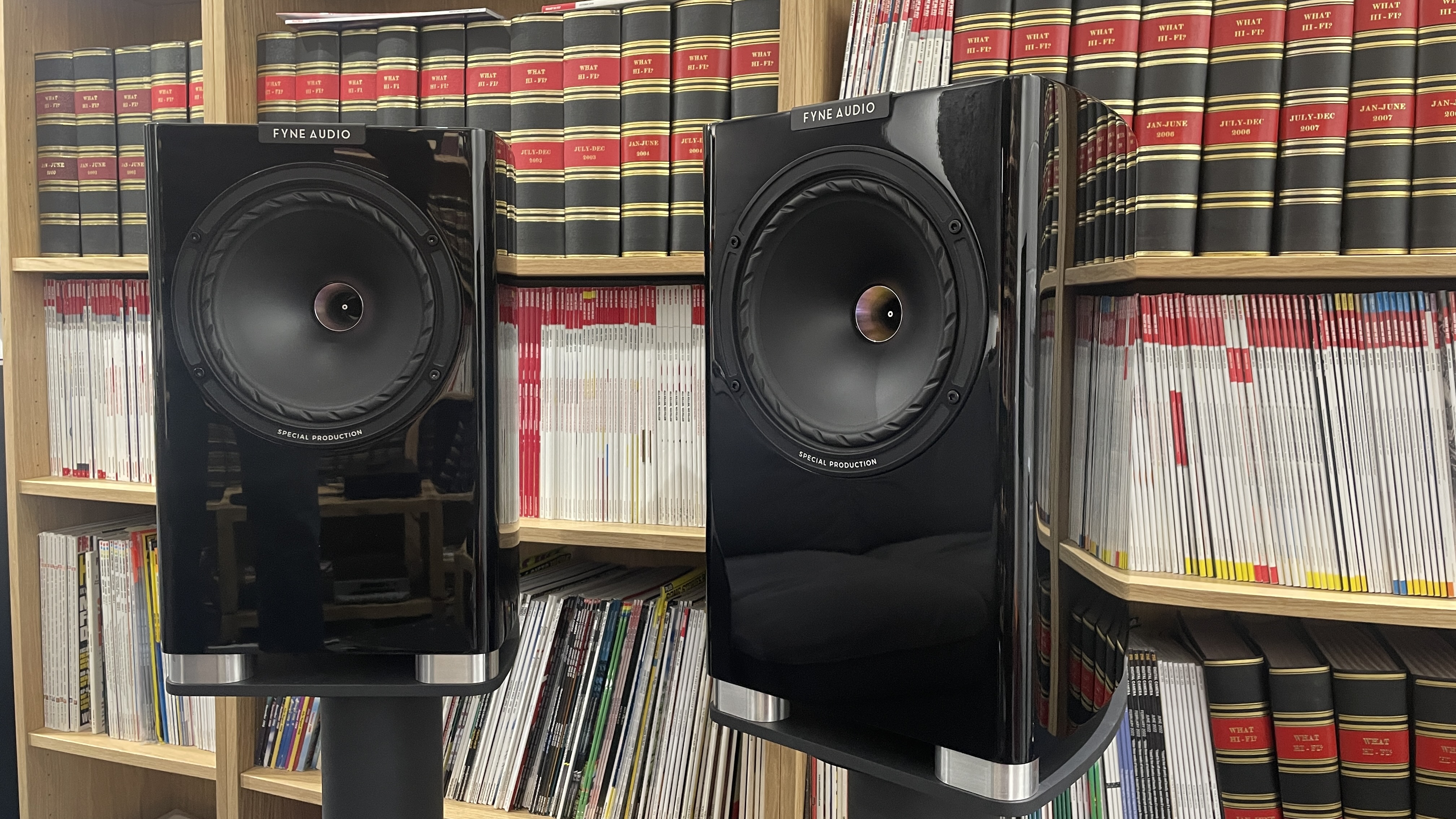 Fyne Audio F701SP with a bookshelf in the background