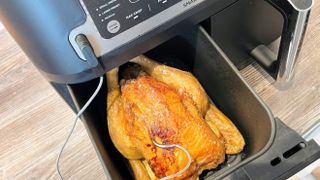 Ninja DZ550 Foodi 6-in-1 10-qt. XL 2-Basket Air Fryer being tested in writer's kitchen