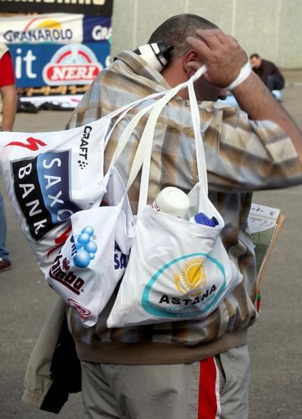 A Soigneur with feedbags.