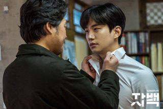 a man holds another man by the collar, in the korean drama 'confession'