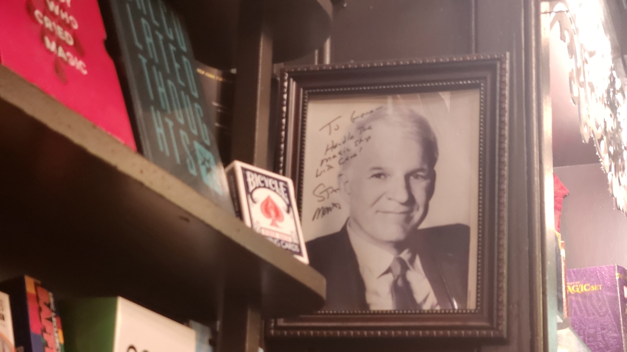 photo of Steve martin on the wall at Disneyland's Main Street Magic Shop