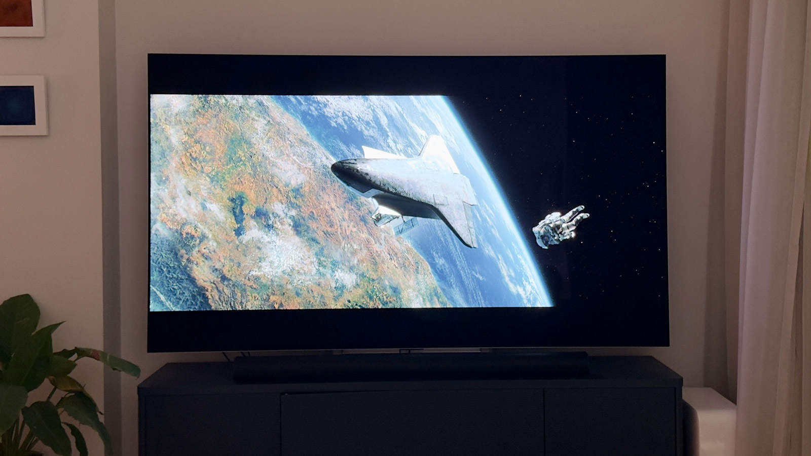 A scene from the movie Gravity displayed on a TV