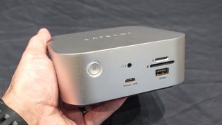 A person holding Satechi's Thunderbolt 5 CubeDock