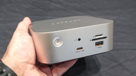 A person holding Satechi's Thunderbolt 5 CubeDock